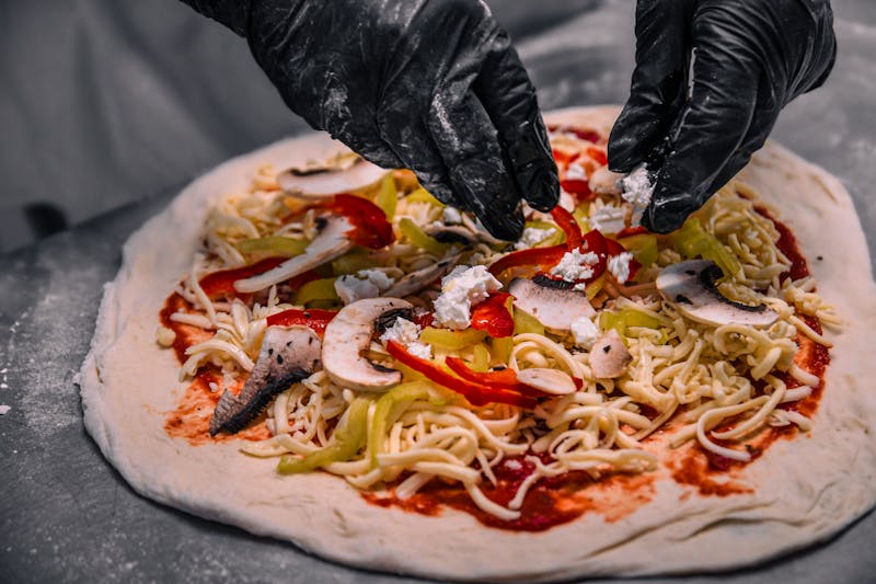 Via 313 pizza loaded with fresh toppings and sauce